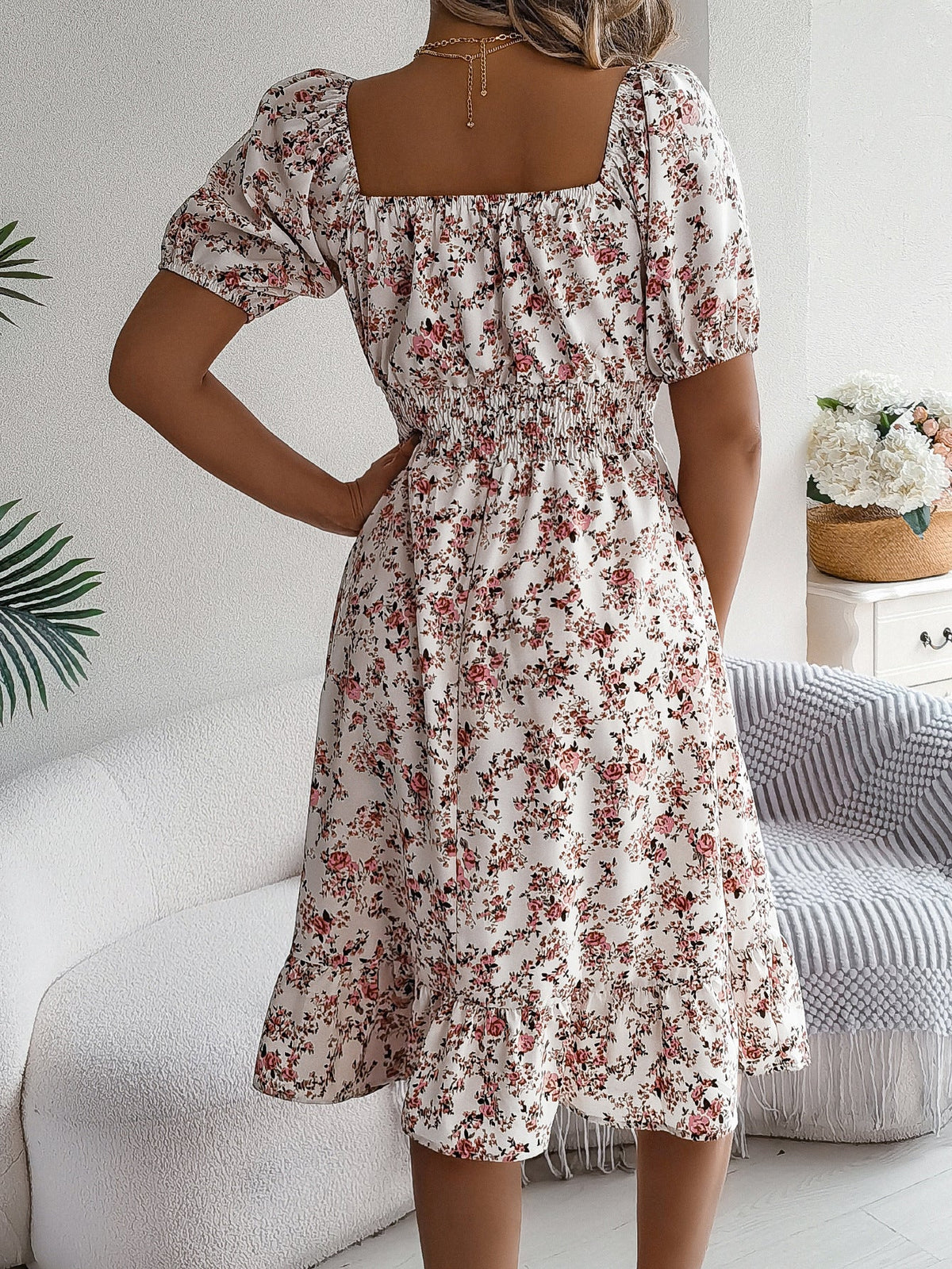Back view of Meadow Muse White floral midi dress