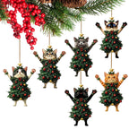 Cat ornaments with Christmas greenery and red baubles