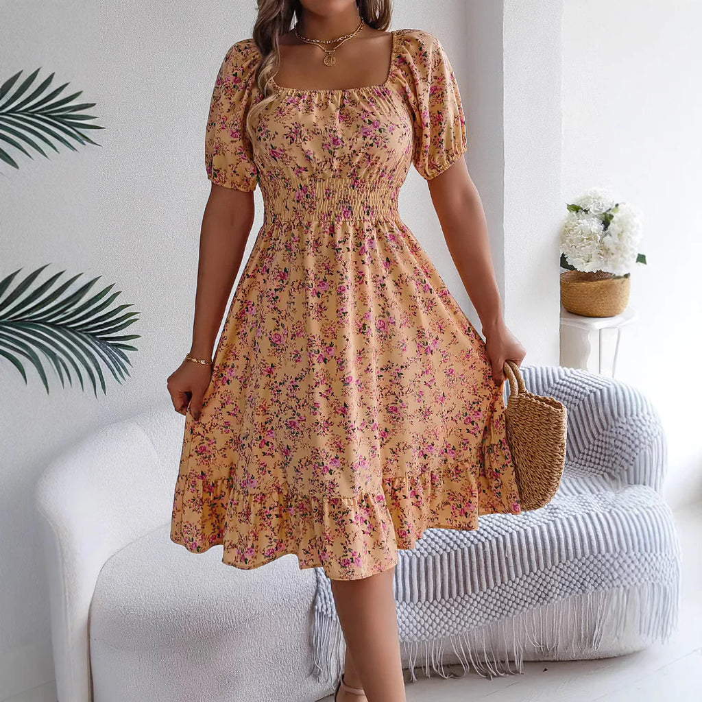 Meadow Muse Yellow floral dress shown standing