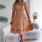 Meadow Muse Yellow floral dress shown standing