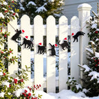 Black cat Christmas bunting in a fence display