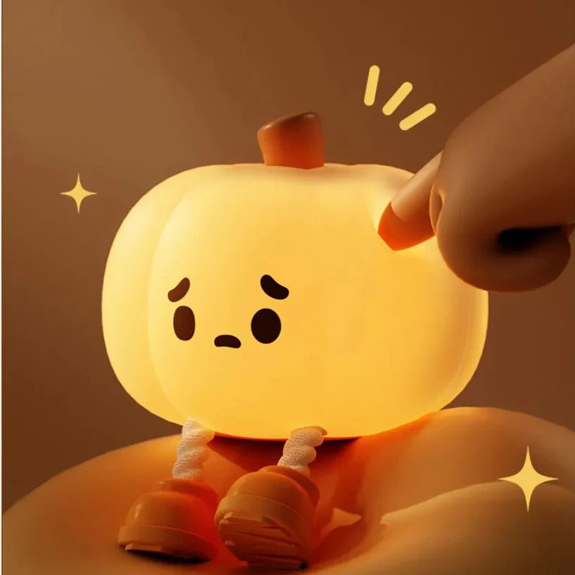 Touch control demonstrated on a soft pumpkin night light