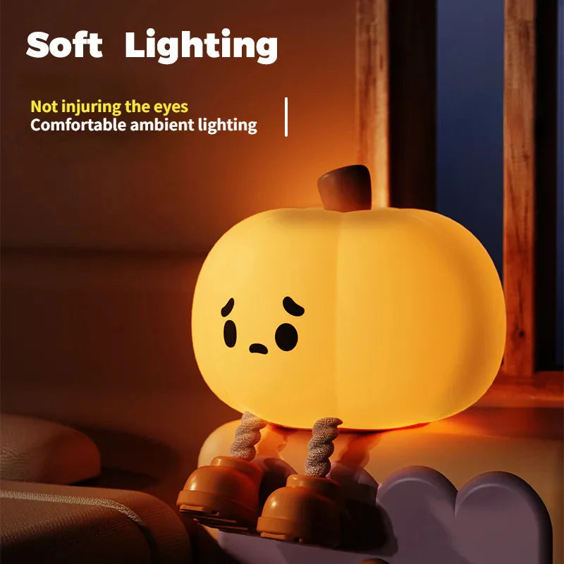 Pumpkin lamp casting a soft glow in a dark room