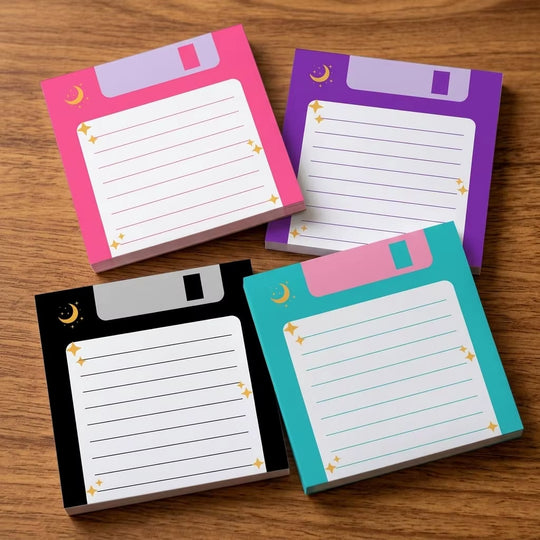 Four mixed-color retro floppy disk sticky-note pads