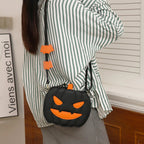 Spooky Black pumpkin purse worn as a shoulder bag