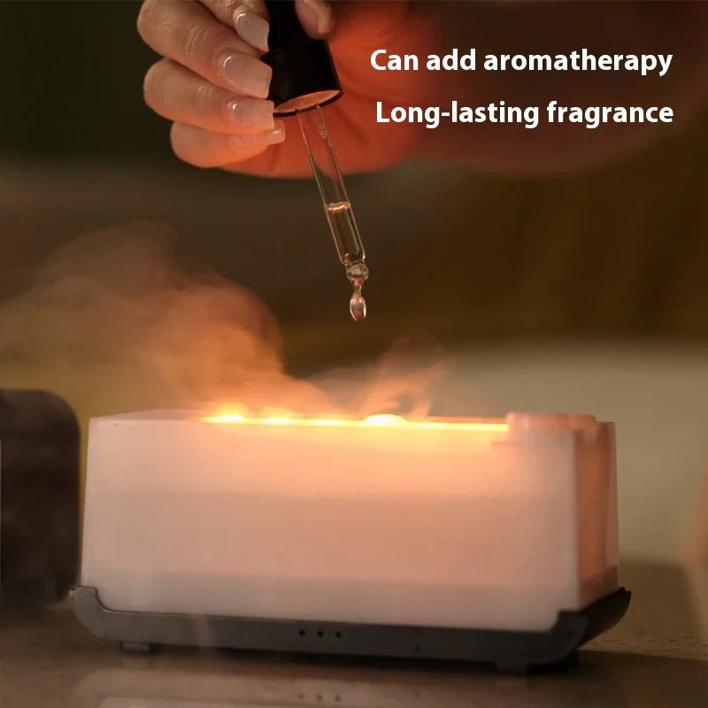 Aroma oil being added to the diffuser reservoir
