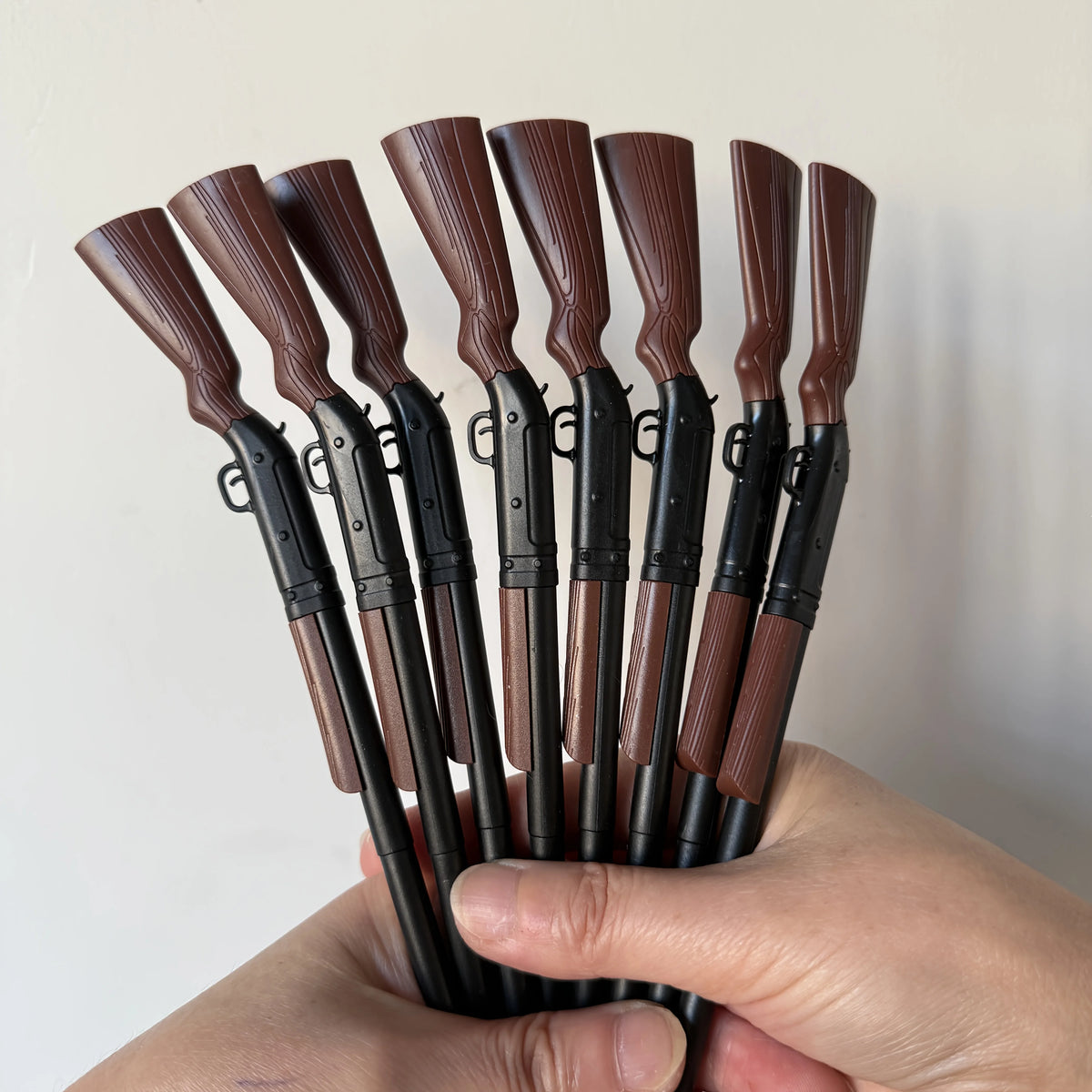 Five novelty ballpoint pens with miniature rifle styling