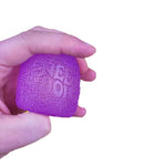 Hand pressing a purple gumdrop fidget toy