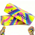 Two rainbow butter squishy toys