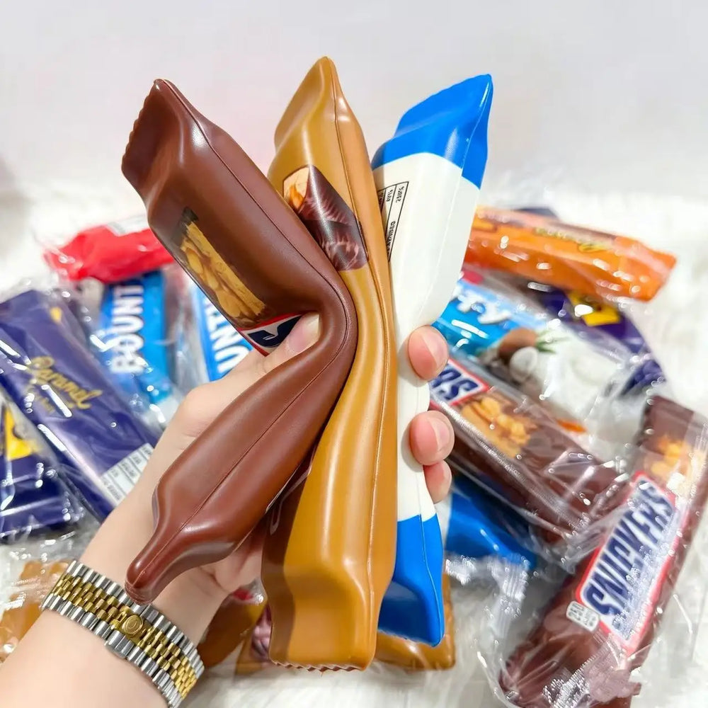 Chocolate bar squishy toys being squeezed