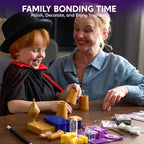 Child and adult practicing magic tricks together with cups and props