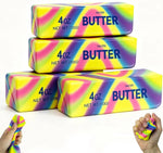Four rainbow butter squishy toys with squeeze demonstrations