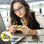 Rainbow butter squishy shown in a desk setting