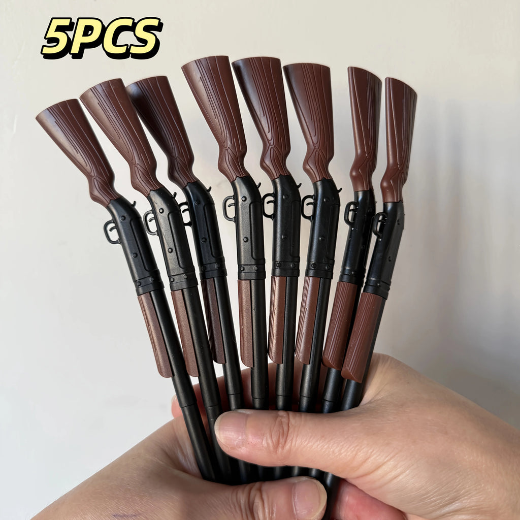 Five brown-and-black rifle-shaped ballpoint pens held in a hand