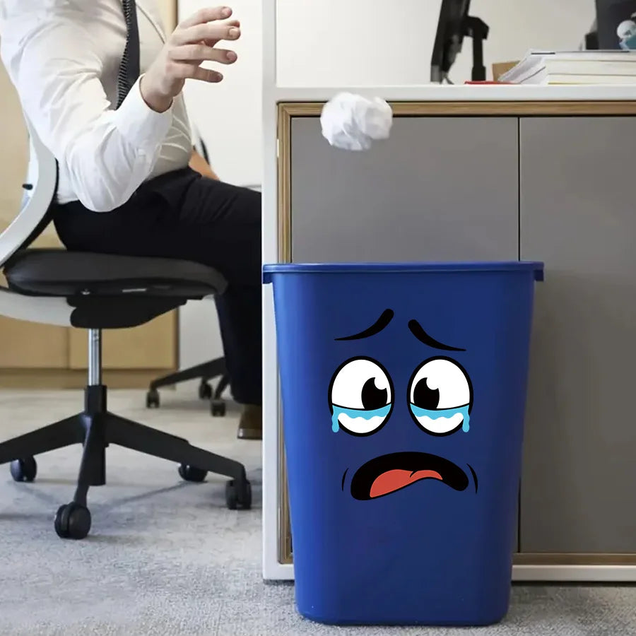 Worried cartoon face stickers on an office bin