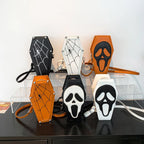 Six skull and spider-web coffin purse styles displayed together