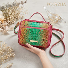 Green crocodile-embossed structured satchel with gold-tone hardware