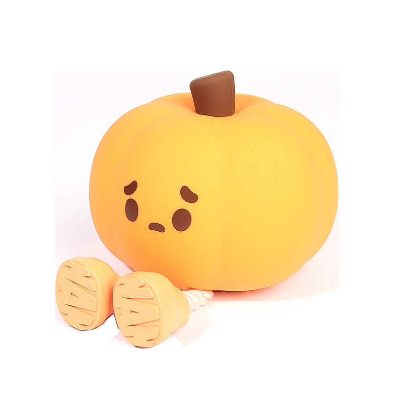 Yellow silicone pumpkin night light with dangling feet