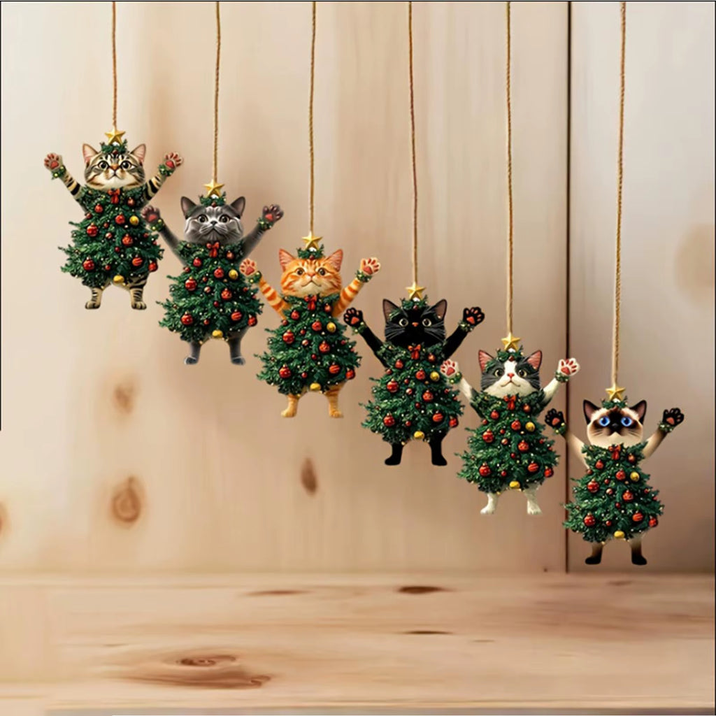 Six cat ornaments displayed on a wooden background